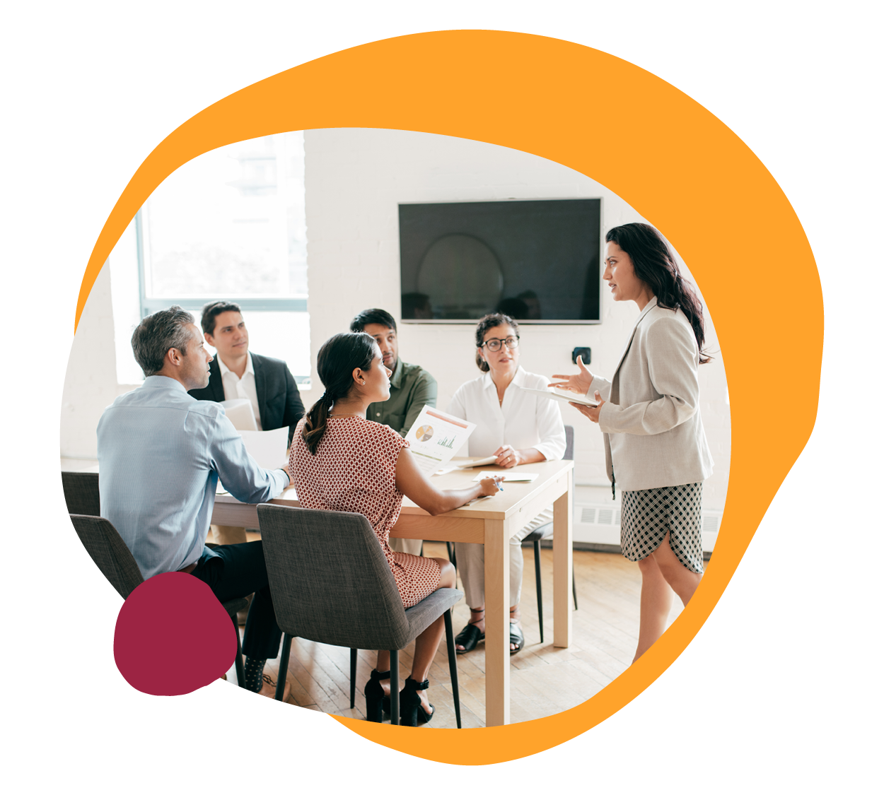 business meeting, female presenter, diverse audience