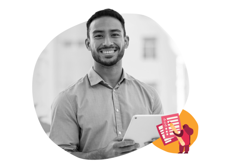 smiling man holding tablet in modern setting with creative graphics, professional attire and engaging expression