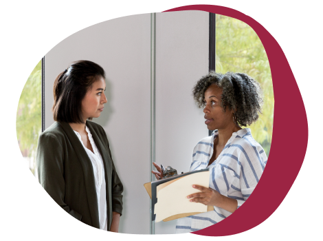 woman-conversing-office, professional-discussion-collaboration