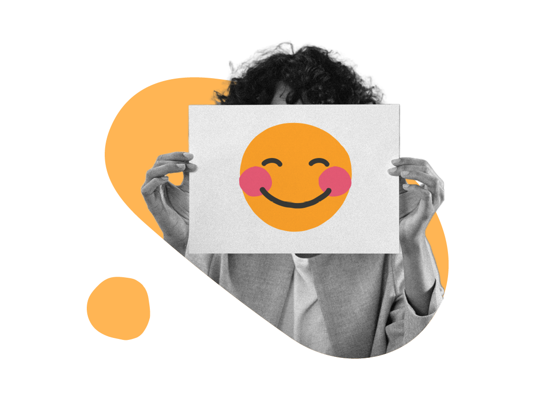 happy face illustration, person holding smiley face sign