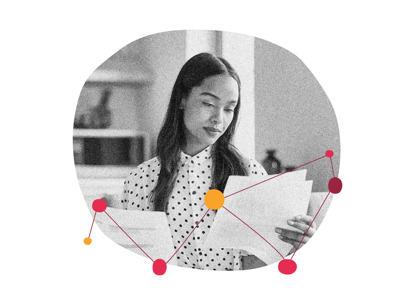 woman reviewing documents, black and white image with colorful abstract connections and polka dot shirt