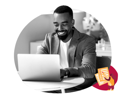 young man smiling at laptop, modern workspace with laptop and notes