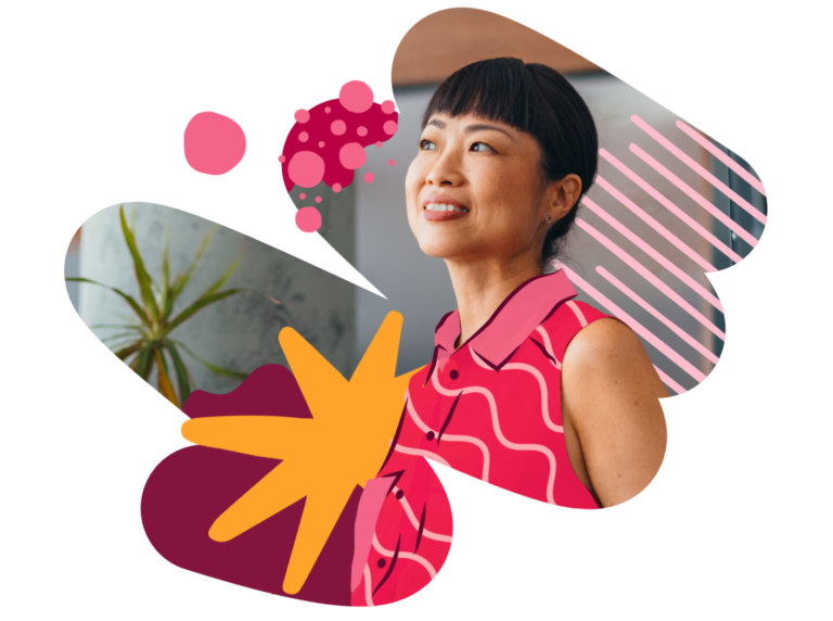 smiling woman in vibrant pink blouse with decorative elements and plants, conveying creativity and positivity, stylish woman with bright decor and cheerful expression