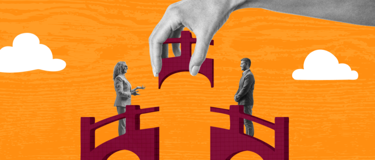 hand placing puzzle piece above two business people on bridges against an orange background with clouds, collaboration and connection theme