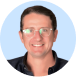 headshot of smiling man with glasses in circular crop against light blue background, professional portrait with modern style