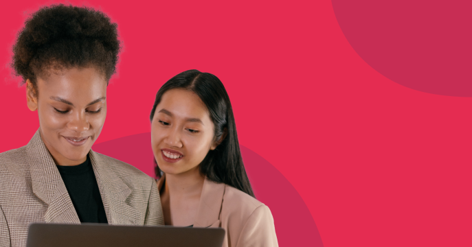 professional women collaborating over laptop, vibrant pink background, smiling, engaged in discussion, women in business, teamwork and technology