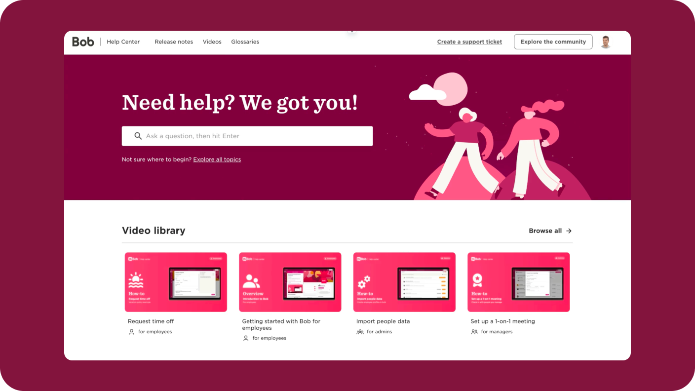 Help center website interface featuring a search bar, vibrant graphics, and a video library for user support. Bob, Support interface with video tutorials.